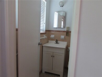 Half Bath is ensuite to one of the bedrooms.