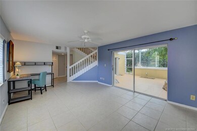 Living Room with Sliders to Screened Patio