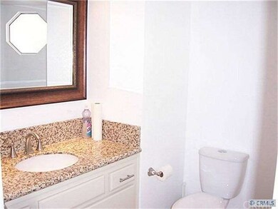 Powder bathroom down stairs.  Granite and custom m