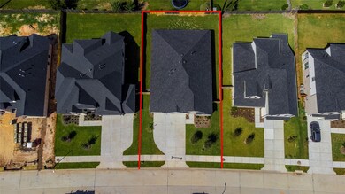 This home sits on a large lot with ample yard space in front and the back, lush landscaping and a well-maintained yard.  Plenty of space to accommodate guest parking and situated on a quiet street.