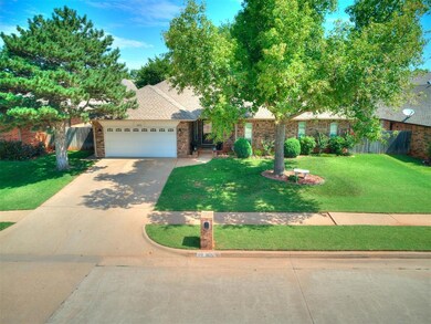 View of front of property featuring a garage and a