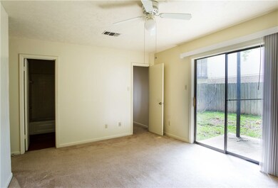 Unfurnished bedroom featuring baseboards, access t