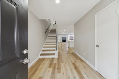 Spacious entryway leads into the living/ dining/ kitchen areas.