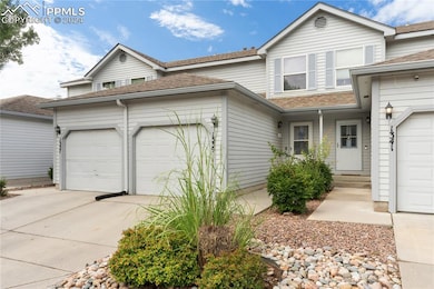 View of front of property with a garage
