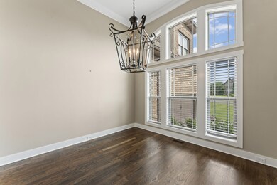 Beautiful formal dining room with lots of natural light