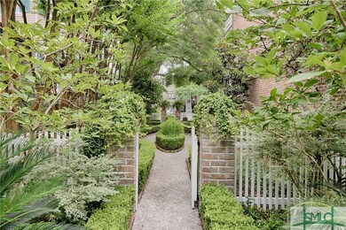 SIDE LOT & GARDEN - This extra city lot, beautiful