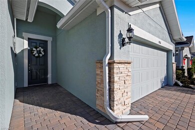 Brick driveway and walkway to front entry