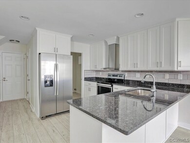 Renovated kitchen with all new cabinets, stainless