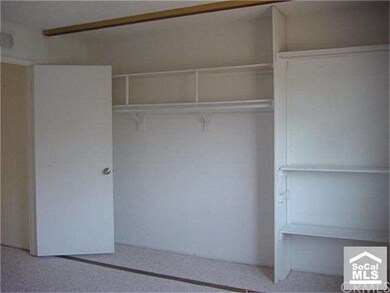 Second bedroom with large closet and storage space