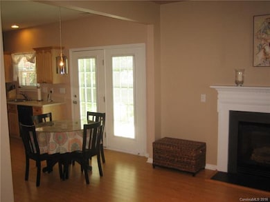 Transition from family room to eat-in kitchen to a