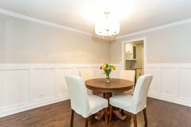 Oversized wainscotting and custom light fixture ad