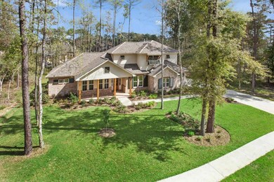 Front yard has mature trees adding to the naturali