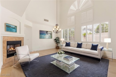 Living area with wood finished floors, baseboards,