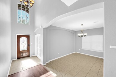 Foyer entry. The double glass door on the left as