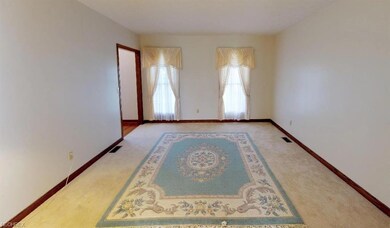 The formal living room makes for a lovely sitting 