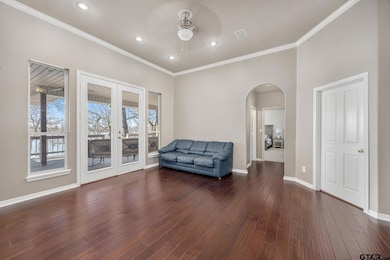 Through the front door is a living area with direc