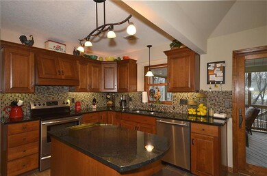AMAZING updated beautiful kitchen...granite, stain
