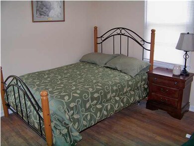 Cozy bedroom, warm oak floors