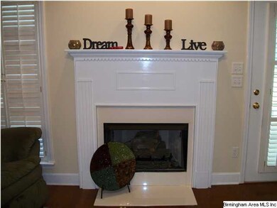Painted wood and marble fireplace surround with ga