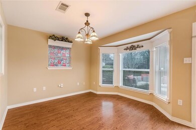 The Dining Room is located with view of the backya