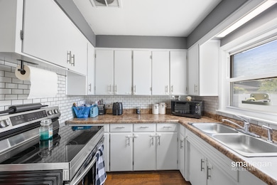 1059 W Summit Ave, Muskegon, MI 49441 - photo 7