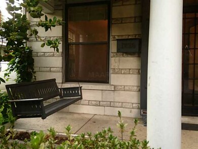 Huge covered front porch with swing.
