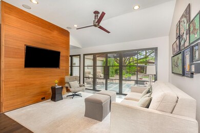 Living area featuring recessed lighting, vaulted c