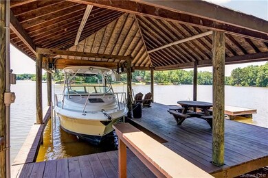 Covered dock with ShoreStation hydraulic boat lift