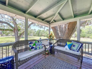 Wrap-round porch lets you enjoy nature … without flying pests!