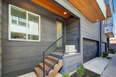 The covered front porch is a warm welcome to you a