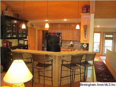 Kitchen with eat in bar