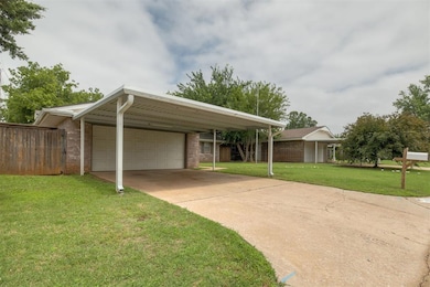 View of front of house with brick siding