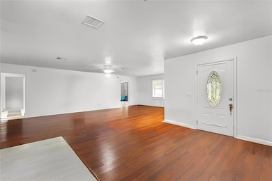 Front Entrance & Living Room (STAGED  Furniture and TV removed