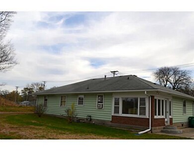 Exterior Back. Look at this 3 season porch!