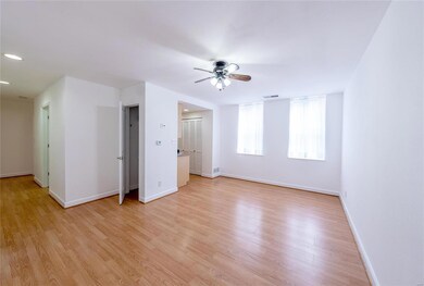 Freshly painted with glistening laminate flooring 
