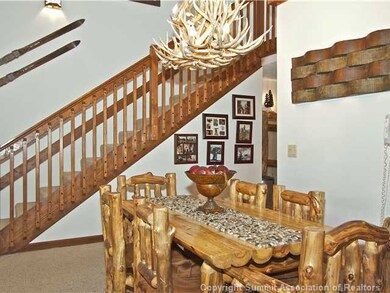 Dining Room. Stunning antler chandelier is suspend