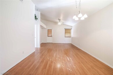 Spacious great room with vaulted ceilings and lami