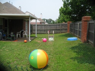 Big fenced back yard with covered patio