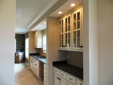 Butlers Pantry between Kitchen and Dining Areas