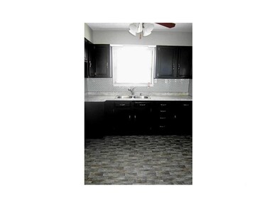 Kitchen. New Counter tops, back splash, flooring a