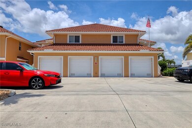 View of front of home with a tile roof, stucco sid