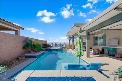View of pool with a patio area, a fenced backyard,