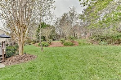 Backyard view from the driveway.