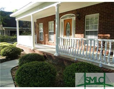 Exterior Front. This nice sitting porch deserves a close-up view.  The custom made banister really gives class to the front.