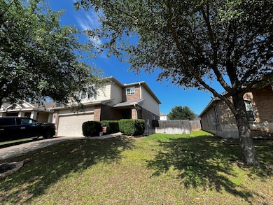 View of side of property featuring brick siding, 