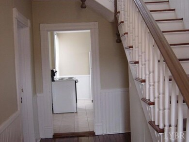 FRONT FOYER TO KITCHEN.