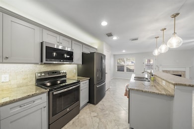 Take in the stunning view of the kitchen, featurin