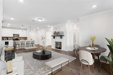 This space is open concept, with hardwood floors f