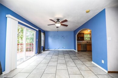 TV can easily mount on wall and have main level entertaining while still in the kitchen area. Quick access to deck for grilling/enjoy wooded lot.