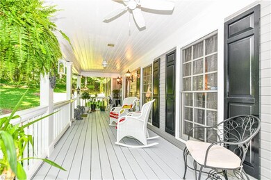 The 8' deep wrap-around front porch will be your favorite spot to start and end your day